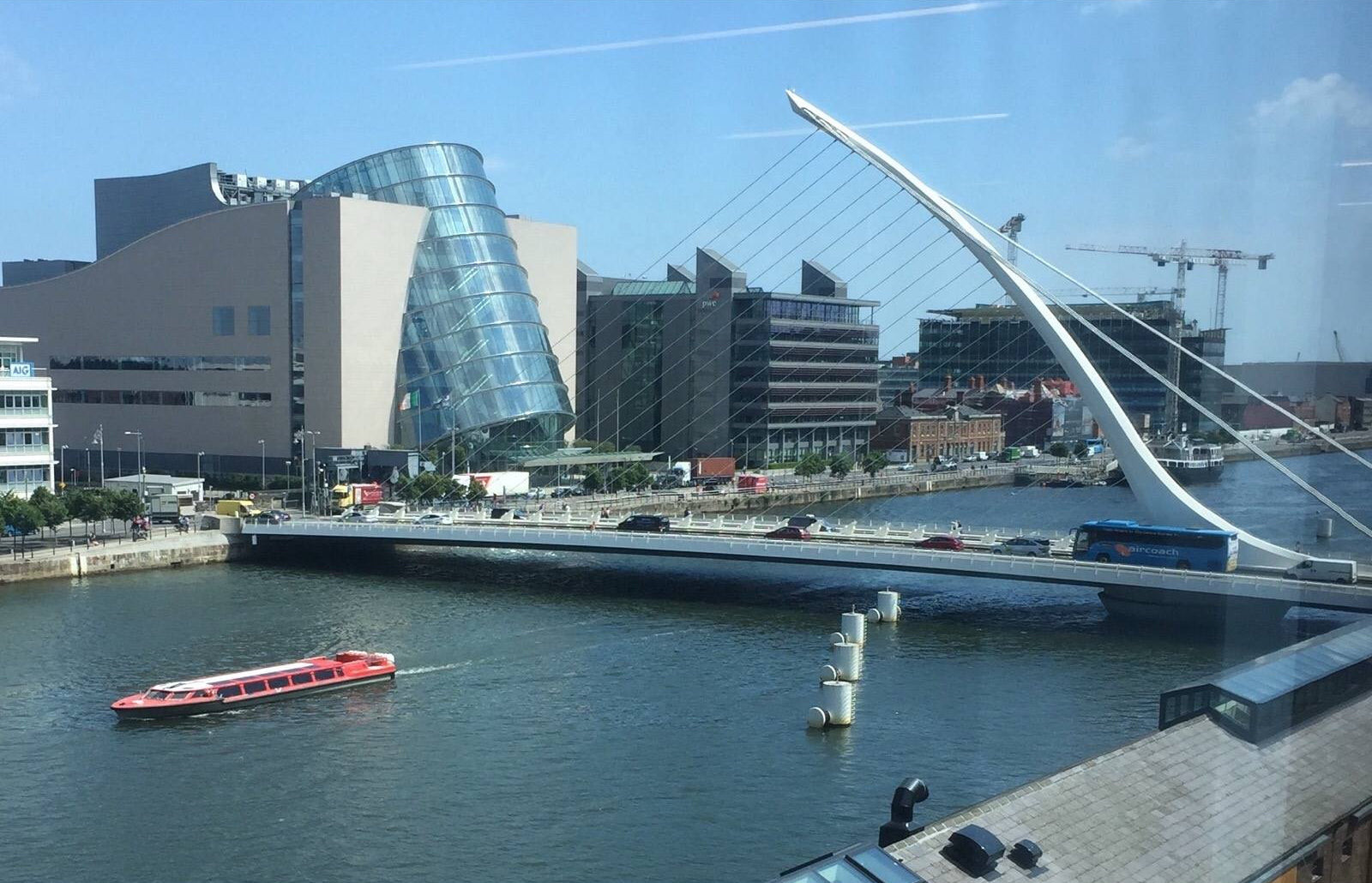 Samuel Beckett Bridge and the Convention Centre beside the River Liffey in sunny Dublin